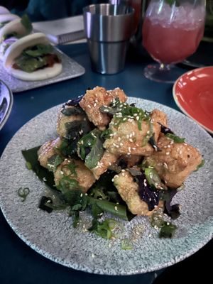Lightly fried perfect tofu, with vegan honey, mint, and more  at Mothership in San Diego