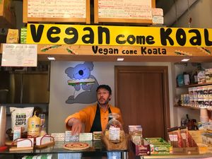 Helpful owner and shop packed with vegan goodies at Vegan Come Koala in Pisa