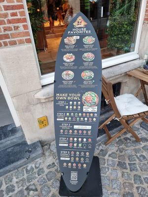 Menu outdoor street sign at Hawaiian Poke Bowl in Bruges