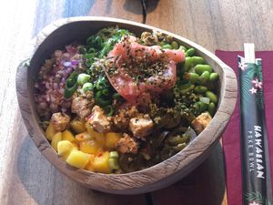 Vegan make your own bowl with ginger, edamame, mango, avocado, jalapeños, and seaweed.  at Hawaiian Poke Bowl in Bruges