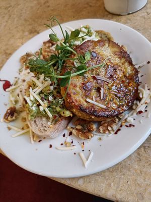 Vegan Spanish omelette with sourdough, avocado and vegan cheese.  In the menu, this is the "poached egg and avocado" but made vegan. at Linen Hall Cafe in Belfast