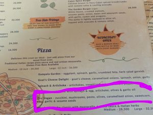 Vegan pizza at Dancing Cup in Kampala