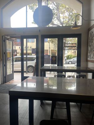 Inside looking out on popular Alvarado st    at Nacho Bizness in Monterey