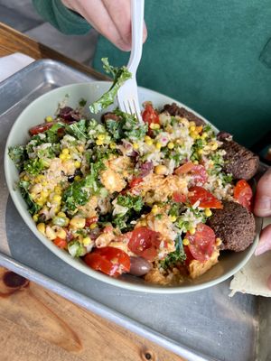 Falafel, greens, tomatoes hummus, corn salad, balsamic vinaigrette, and more!    at Mezeh in Chesapeake City