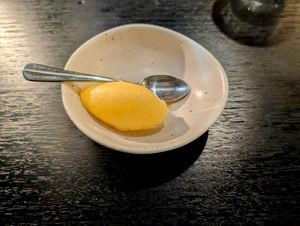 Mango sorbet, brought out after being told there was no vegan dessert, but they didn't want to leave me with nothing while my omni dining partner had dessert. A sweet gesture. at Stillwater in Launceston