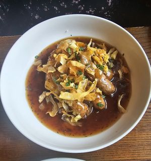 Cumberland sauage, mash, crispy parsnips and gravy at The Fleece Inn in Keighley