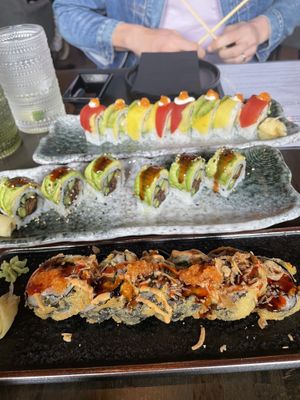 Rainbow roll, dragon roll, volcano roll  at Nori in Austin