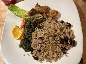 Calloo and okra dish with plaintain, rice and peas (beans)   at Kool Runnings Jamaican Restaurant in Inverness