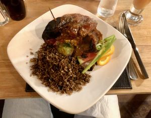 Vegan chunks with cabbage in delicious spicy sauce (tastes better than it looks!)  at Kool Runnings Jamaican Restaurant in Inverness