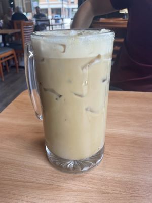 Vegan iced oat milk latte   at Un Mundo Café in Springfield
