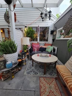 Outdoor covered patio seating option at Abroad in Orleans