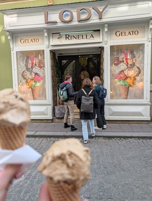 Coffee ice cream and storefront at Lodziarnia Rinella Gelato in Krakow