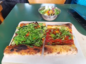 Two slices and menu salad at VITO Europaallee in Zurich