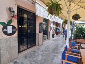 Front with seats outside at La Cibulina in Sant Feliu De Guixols