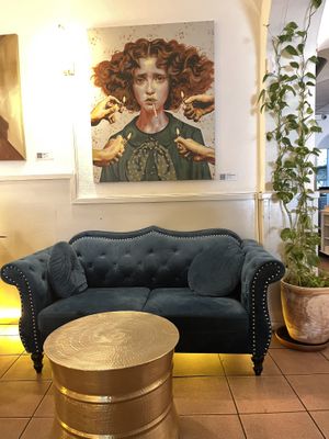 They have really cool paintings, makes the whole Restaurant a interesting and cozy space  at Antù in Lisbon