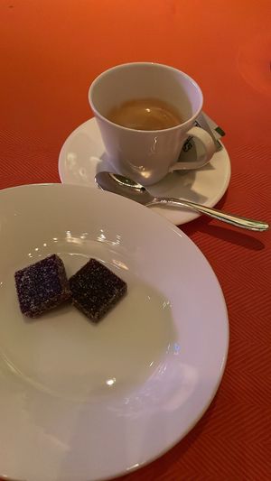 Black currant Prosecco gelees (complimentary dessert) with espresso at Wynn Hotel - Sinatra in Las Vegas