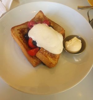 French Toast: Coconut cream, mixed berries, maple syrup at Wynn Hotel - Terrace Pointe Cafe in Las Vegas