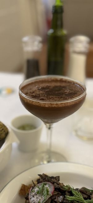 Rose: Vegetable milk, chocolate, strawberry, pepper, citrus juice, almond syrup  at Quitéria in Rio De Janeiro