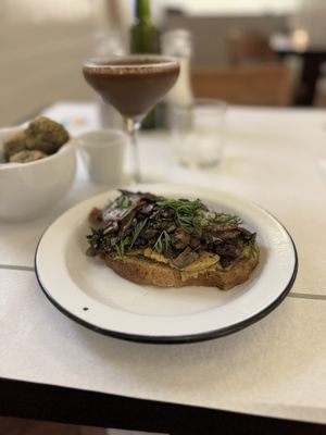 Mushroom and hummus on toasted sourdough  at Quitéria in Rio De Janeiro