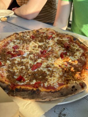 Field roast pizza with vegan cheese  at Humble Pie in Seattle