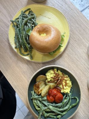 Bagel with tofu scramble and brekkie bowl   at Holy Llama  - Imittos in Athens