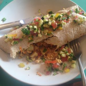 This was the delicous burrito they had on their Easter Menu and I hope it makes it into their regular menu! :) So good! Potatoes, tofu, home made nut cheese... With their salsa on top. :) at The Clever Rabbit in Edmonton