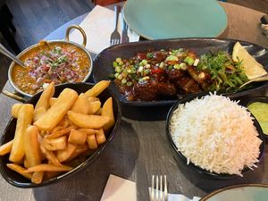 Tarka dahl, spicy wings, chips, ricee  at Soho Tavern in Kibblesworth