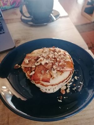 Vegan pancakes with vegan bacon, chopped walnuts and aggave syrup at Santih Holistics in Kidderminster