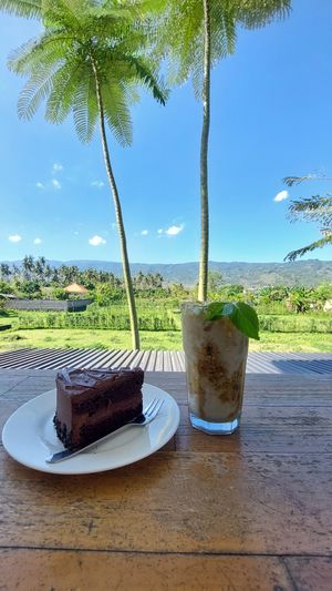 Chocolate cake & caramel ice coffee  at Coffeenosky in Lovina