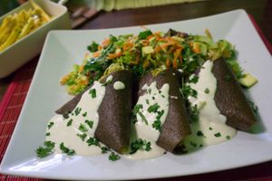 Raw Samosa with zucchini, gold flax seeds, curcuma, dried tomatoes and spinach
 at BEMBA rawfood & plant-based in Bratislava