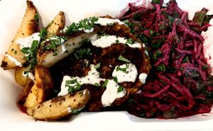 Daily special. Buckwheat patties,baked potatoes, coleslaw style beetroot salad.  at BEMBA rawfood & plant-based in Bratislava