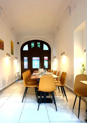 Minimalistic, cozy interior - event setup. at BEMBA rawfood & plant-based in Bratislava