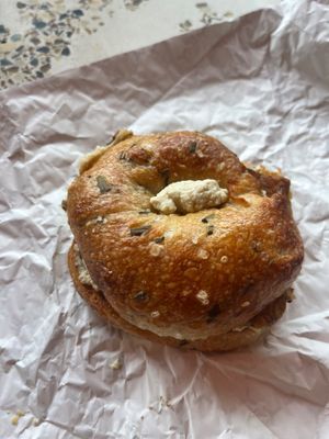 Tofu Ricotta & Tempeh on a Vegan Rosemary bagel  at Humble Wood Fire (Bagel Shop) in Gainesville