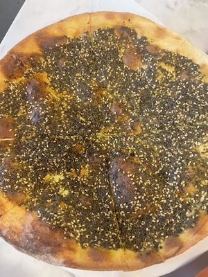 Za’atar manoushe (crispy flat bread)  at Tanoor - Seattle in Seattle