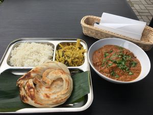 Chicken Curry with parotta bread  at Saravana's Dosa and Curry in Wroclaw