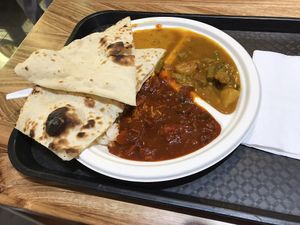 Selection of curries, naan, rice (all vegan) at Dosa Plaza - Metro Centre in Auckland