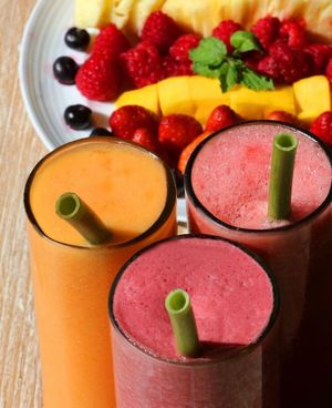 Fruit juices. Water melobi and Papaya in season  at Earth Market in Enschede