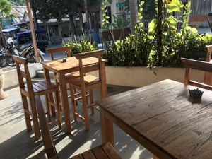 Tables outside  at The Juice Bar by Bajo Bloom in 