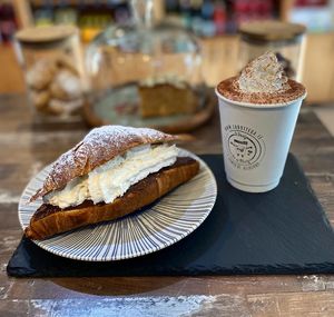 Vegan croissant with Vegan Chocolate and Coconut Cream. Hot chocolate on Oat Milk with Coconut Cream at La Bottega Italian Grocery & Coffee Shop in Kilkenny