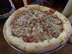 Vegan pizza with garlic onions bell peppers and mushrooms    at 600 Degrees Pizzeria Drafthouse in Georgetown