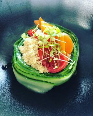  spicy tahini quinoa, tomato & apricot tartar. Decorated with house grown microgreens at Green Life Market in Sarande