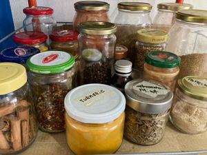 Easy on the salt! We use real spices. This shelf is just 1, w' different spices, herbs, specialty blends ranging in citrus's (lemon grass, coriander) to sweet cranberry &spice at Green Life Market in Sarande