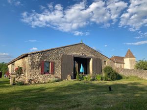 The bedrooms are in the converted barn next to the Manor  at A Bedat Life in Saint-aubin-de-branne