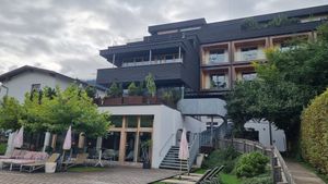 View of the hotel from the outside-pool at Mari Pop Hotel in Ried Im Zillertal