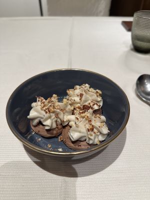 Main dessert: delicious mousse with nuts   at L'Evangelista Ristorante & Enoteca in Verona