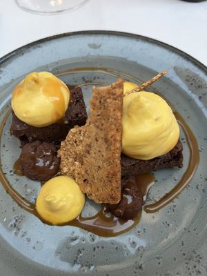 Chocolate brownie with passionfruit cream  at L'Evangelista Ristorante & Enoteca in Verona