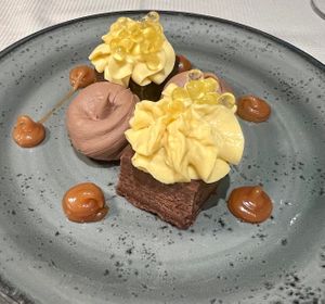 Brownie dessert with chocolate and mango mousse at L'Evangelista Ristorante & Enoteca in Verona
