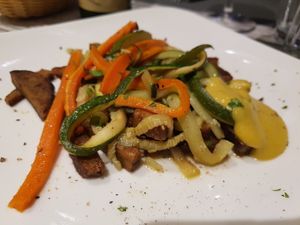 Tempeh with vegetables at Osteria di Fuori Porta in Padua