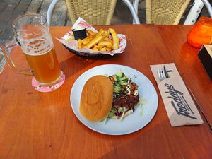 Seoul treat aka kimchi burger with portion a fries with vegan mayo and a pint Paulaner at Freddy's Beerkitchen in Nijmegen