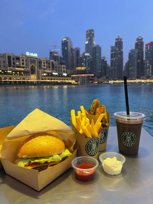 Get you meal on with the beautiful view of Downtown Dubai! at Vegan Burger - Dubai Mall in Dubai